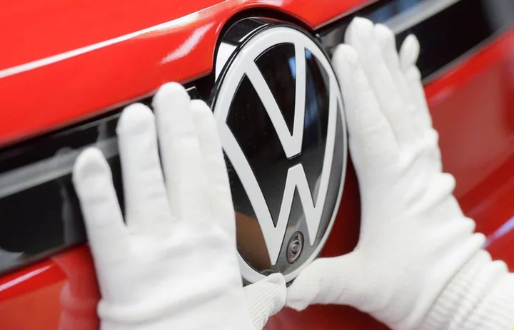 Volkswagen brand cost-cutting plan running behind schedule - sources