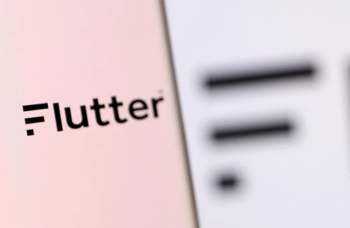 Flutter sees FY earnings at bottom of range, to delist in Dublin