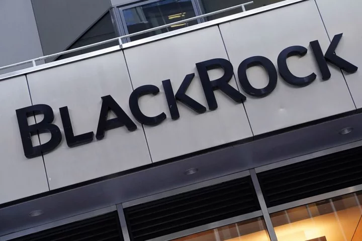 BlackRock to call staff back to office at least four days a week - memo