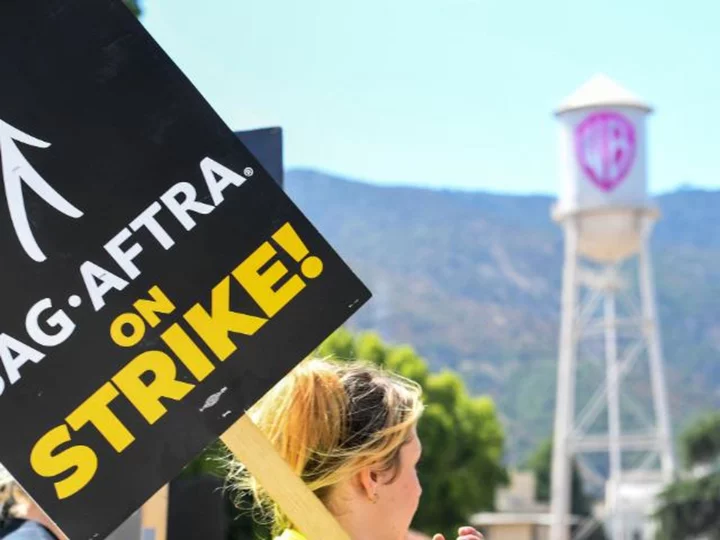 Warner Bros. Discovery says actors and writers strikes will cost it up to $500 million this year