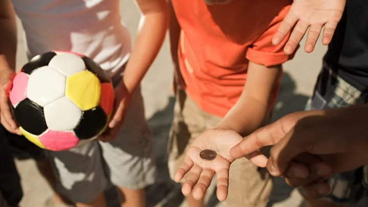 Teacher says students are 'tormenting' her with new 'coin boys' flipping trend