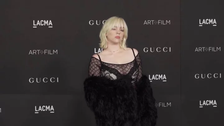 Billie Eilish reacts to 'insane' crop top edit of her on fake CNN News account