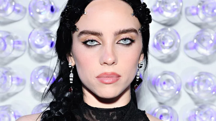 Billie Eilish cheekily responds to her bikini photo showing off chest tattoo