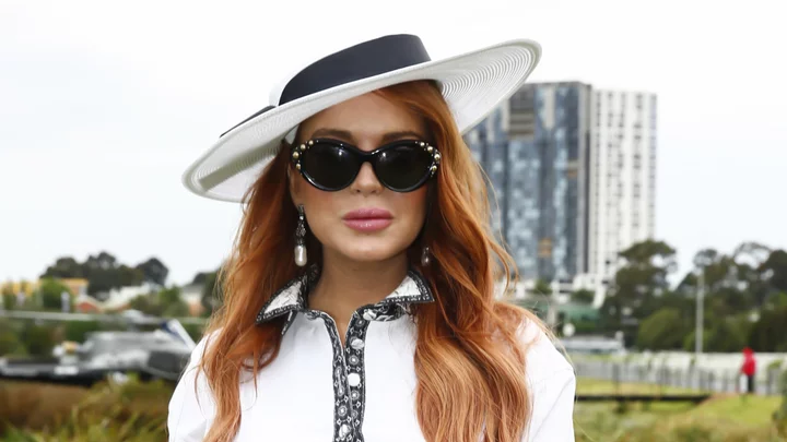 Pregnant Lindsay Lohan's beach getaway is grool