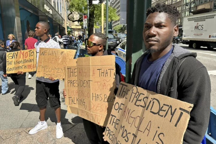 At the edge of the UN security perimeter, those with causes (and signs) try to be heard