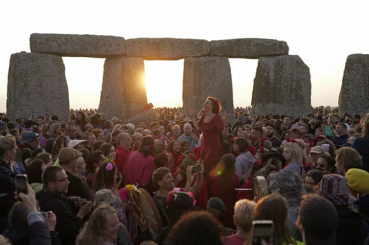 All hail the rising sun! Stonehenge welcomes 8,000 visitors for the summer solstice