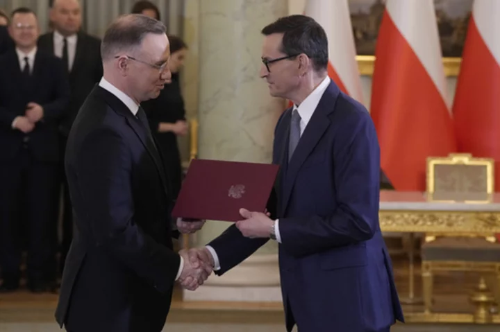 Poland's president swears in a government expected to last no longer than 14 days