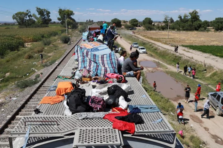 Migrants aboard Mexico cargo trains stranded miles from U.S. border