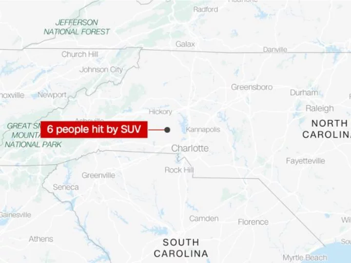 6 migrant workers were hit and injured by an SUV outside a North Carolina Walmart, and authorities are searching for the driver, police say