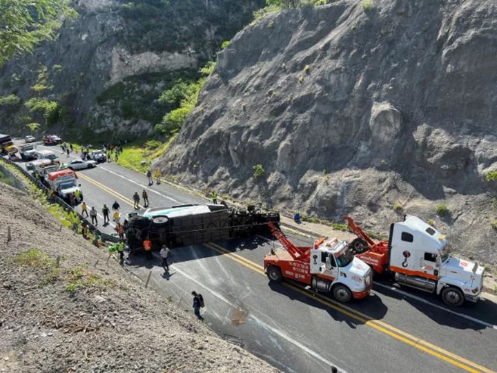 16 dead and 36 injured after bus carrying migrants and locals crashes in Mexico, officials say