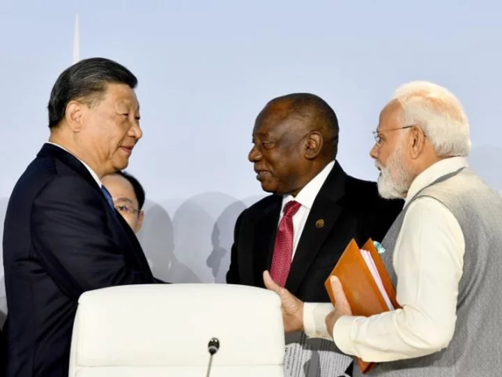 India's Modi and China's Xi agree to 'intensify efforts' to deescalate border issue following rare meeting