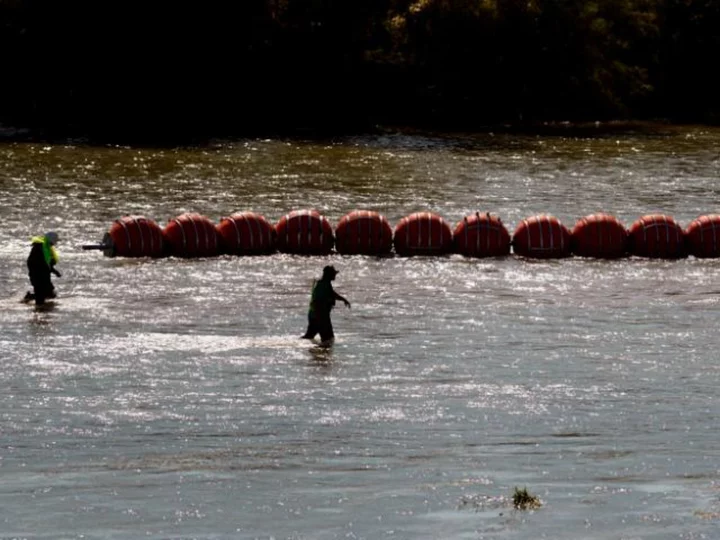 Justice Department planning legal action against Texas over floating border barrier