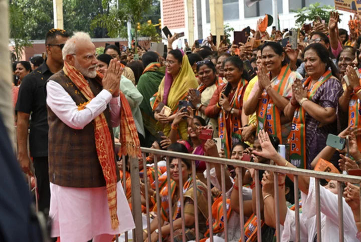 India’s Parliament passes law that will reserve a third of legislature seats for women from 2029