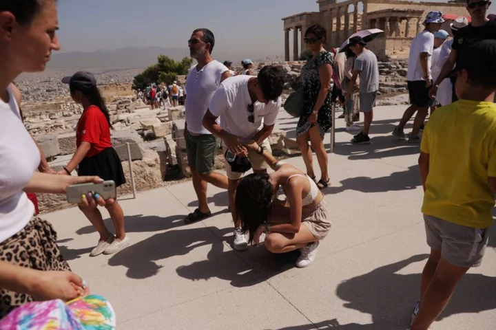 'Heat storm' stretches into southern Europe, health alerts issued