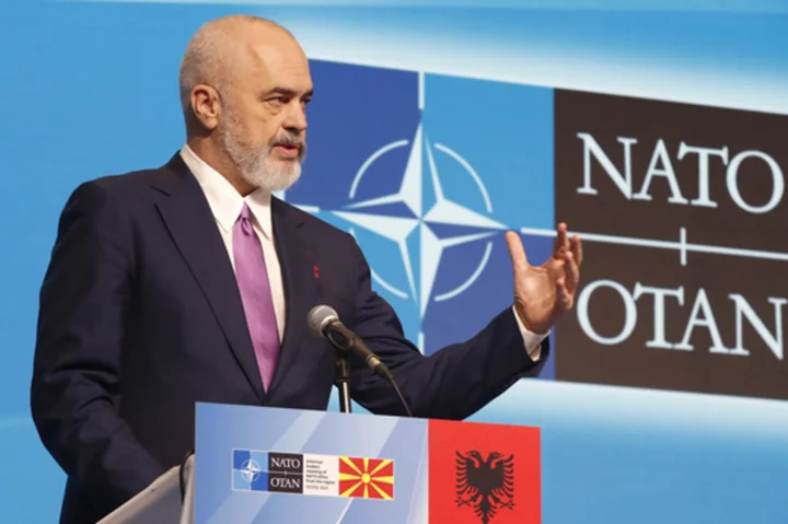 Albania's prime minister calls for more NATO troops in neighboring Kosovo following ethnic violence