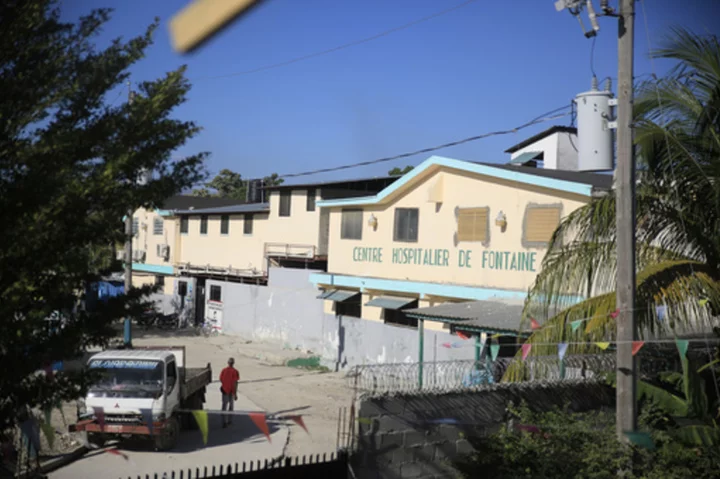 Hospital director in Haiti says a gang stormed in and took hundreds of women and children hostage