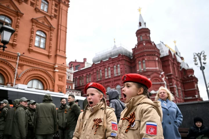 Russians mark Victory Day in shadow of Ukraine