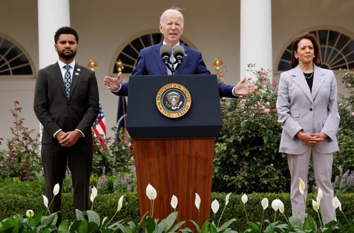 Biden, with few options on guns, sets up ceremonial office