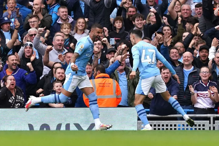 Man City march on despite Rodri red card