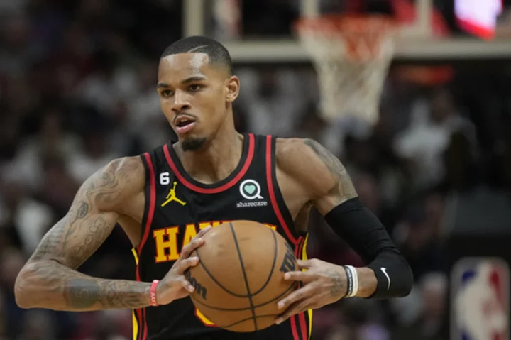 Hawks agree to $120 million, 4-year contract extension with Murray, AP source says