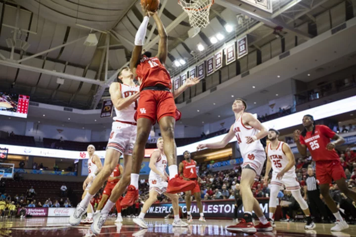 LJ Cryer helps Houston withstand surge by Utah, win 76-66 in Charleston