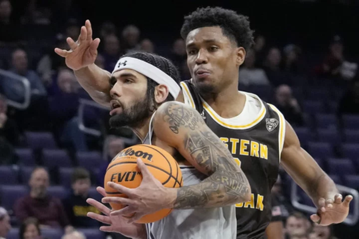 Buie scores 21, Barnhizer adds 20 to help Northwestern beat Western Michigan 63-59