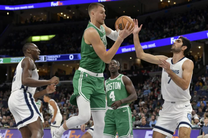 Kristaps Porzingis scores 26, including winning dunk with a minute left as Celtics defeat Grizzlies