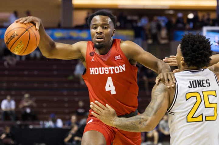 Cryer has 18 points to lead No. 6 Houston to 65-49 victory over Towson at the Charleston Classic