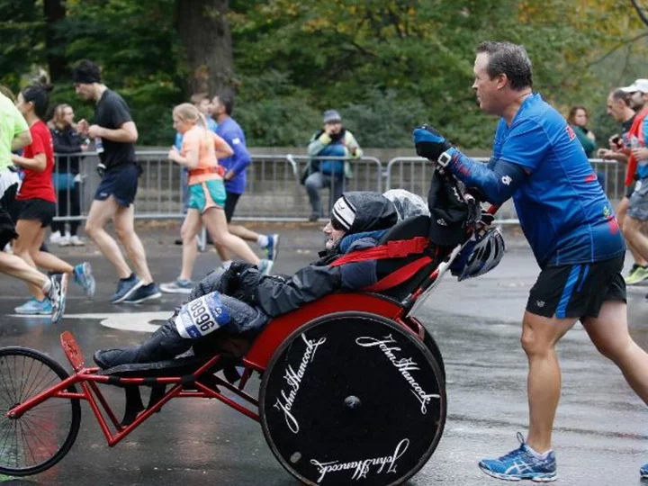 Rick Hoyt, whose late father pushed him through decades of Boston Marathons and other races, has died at 61