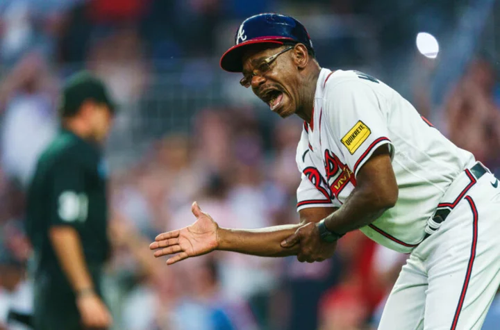 Wash knows all: Braves coach looked insulted replay was needed on game-winning play