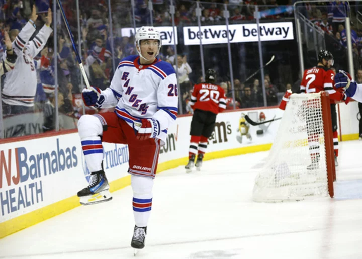 Vesey and Panarin each score twice as streaking Rangers beat rival Devils 5-3