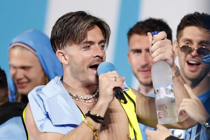 Jack Grealish revels as Manchester City parade treble