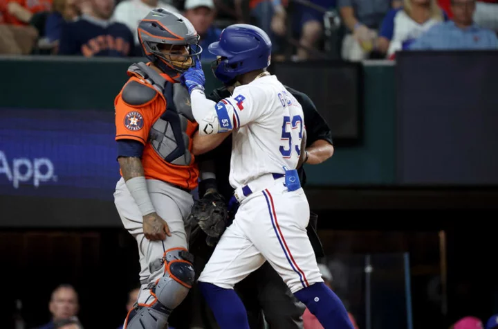 Benches clear, ejections follow in ALCS after Astros hit Adolis Garcia