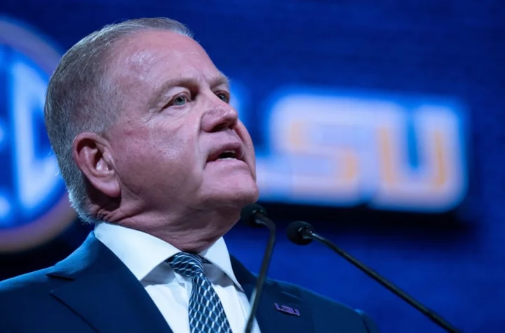 What is Brian Kelly’s salary with LSU football?