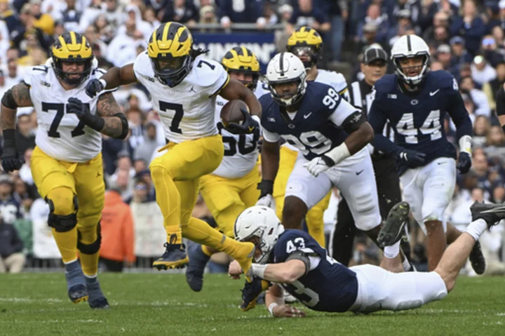 No. 2 Michigan looks to stay unbeaten at Maryland. Harbaugh may, or may not, be on sideline