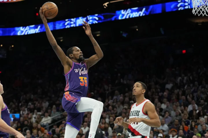 Durant scores 31, now 11th all time in points, Suns roll past Portland 120-107