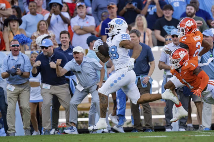 Rivals North Carolina and North Carolina State bring 8-win marks into latest neighborly tussle