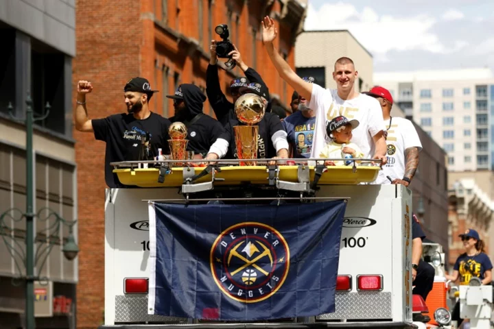 Thousands celebrate NBA champion Nuggets at parade