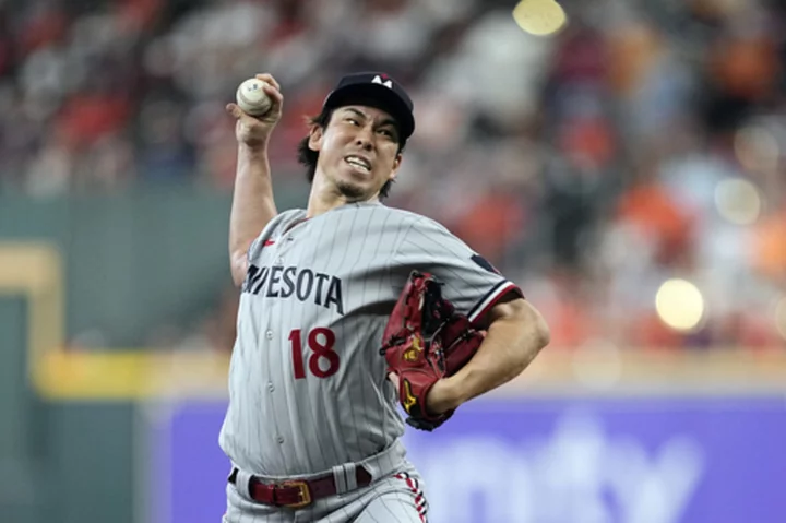 Pitcher Kenta Maeda and Detroit Tigers agree to a $24 million, two-year contract, AP source says