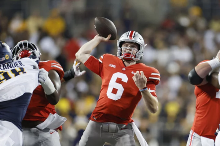 New quarterbacks steal spotlight as No. 3 Ohio State and Indiana open their seasons in Big Ten tilt