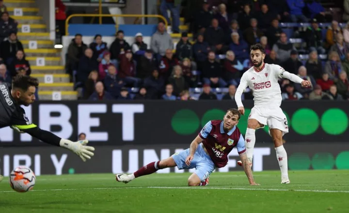 Soccer-Fernandes eases pressure on United with winner at Burnley