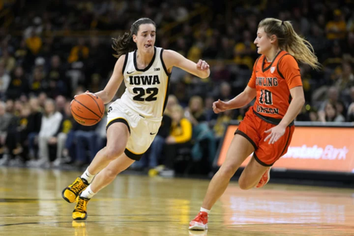 Clark's 24 points, 11 assists lead No. 4 Iowa women past Bowling Green 99-65