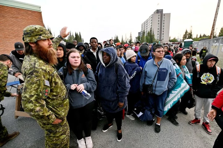 Yellowknife residents abandon town and Canada fires spark new evacuations