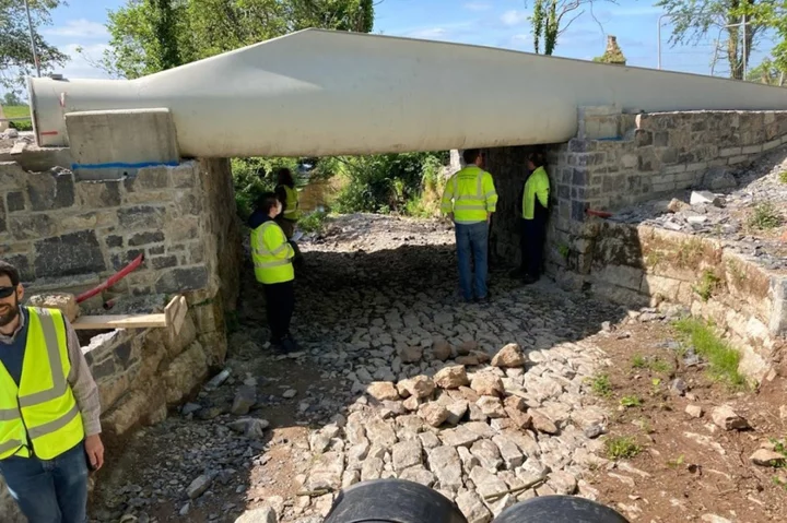 Wind turbine blades repurposed into bridges