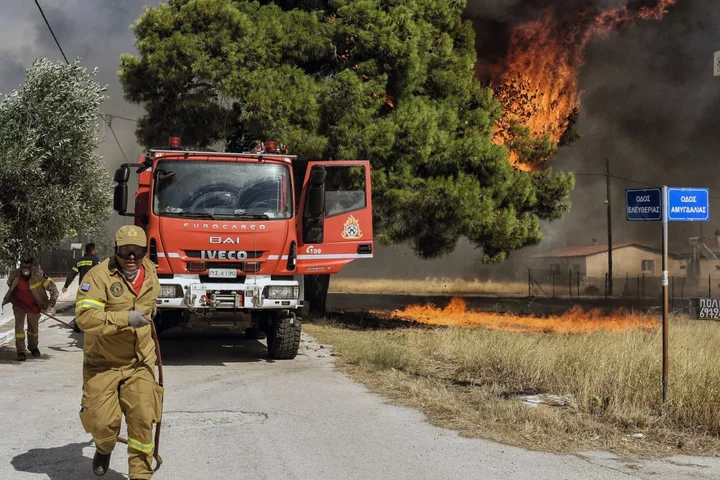 Wildfire Moves Closer to Athens on High Winds and Saharan Heat