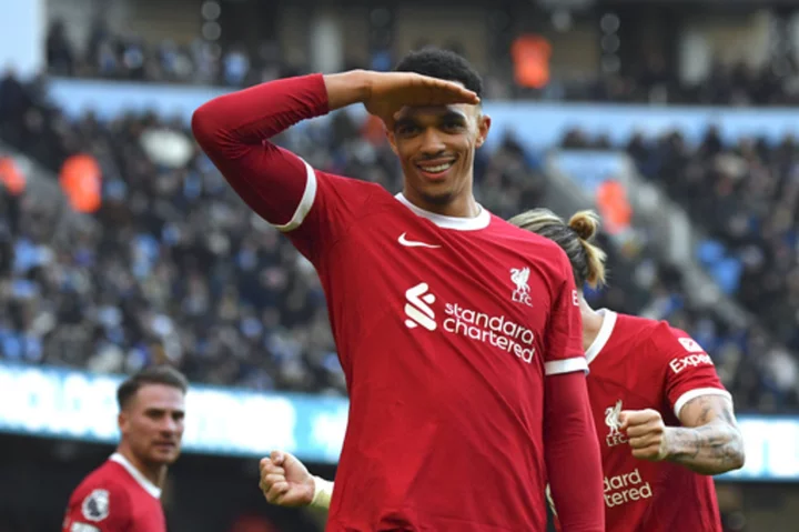 Alexander-Arnold earns Liverpool 1-1 draw against Man City. Haaland sets scoring record