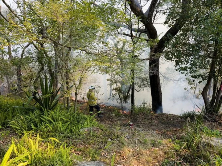 Australia state swings from bush fires to flash flooding in 24 hours