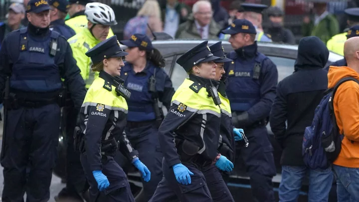 Thirteen charged after Irish parliament protests