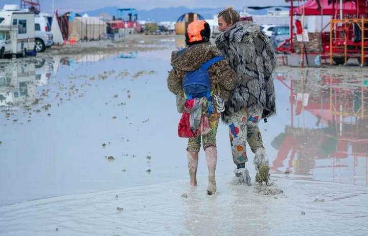 One death reported at Burning Man, thousands stranded in mud and rain