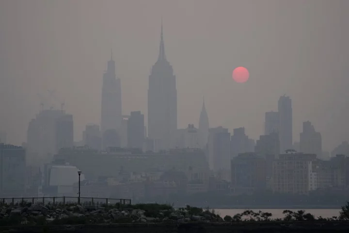 AOC and Bernie Sanders warn that Canada wildfire smoke is sign of climate crisis catastrophe to come